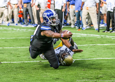 Duke QB Boone lunges for the end zone
