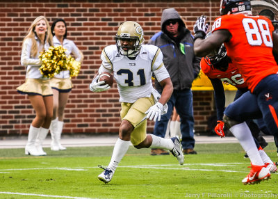 Tech A-back Deon Hill escapes the Cavs defense and sprints down the sidelines