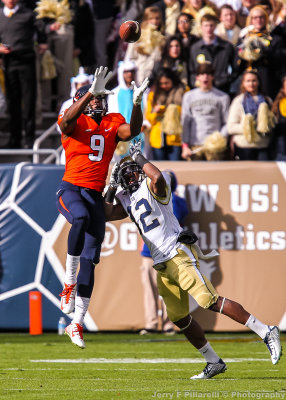Virginia WR Canaan Severin hauls in a pass over GT DB Demond Smith