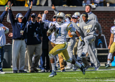 Jackets DB Jamal Golden returns an interception 85 yards for a touchdown