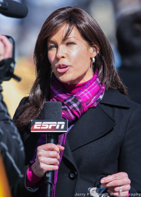 ESPN on field correspondent Jeannine Edwards files a report during the game