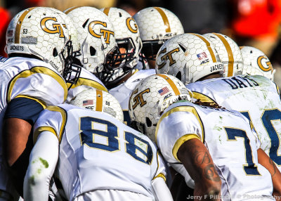 Georgia Tech team huddles on offense