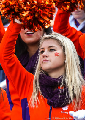 Clemson Dance Team Member cheers from the stands