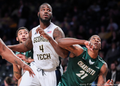 Tech C Demarco Cox wrestles for rebounding position with Charlotte F Willie Clayton