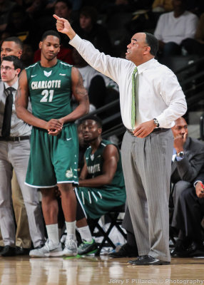 Charlotte 49ers Head Coach Alan Major instructs his team from the sideline