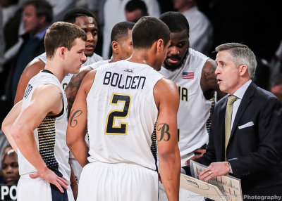 Georgia Tech Yellow Jackets Head Coach Brian Gregory assembles his players during an official's timeout