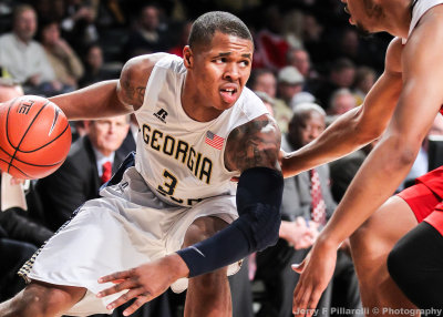 Yellow Jackets F Marcus Georges-Hunt leans in on his way to the basket