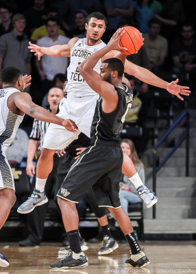 Jackets G Chris Bolden leaps to disrupt a pass from Deacons G Miller-McIntyre