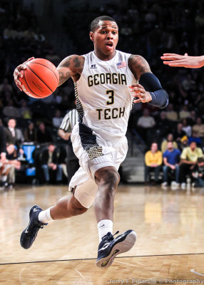 Yellow Jackets F Marcus Georges-Hunt drives to the basket