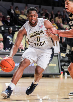 Yellow Jackets F Charles Mitchell drives the baseline on a Wake Forest defender