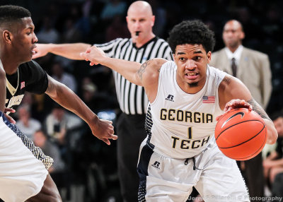 Yellow Jackets G Jackson moves around a Deacons defender