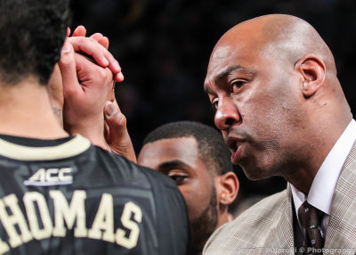 Wake Forest Demon Deacons Head Coach Danny Manning in the huddle during a timeout