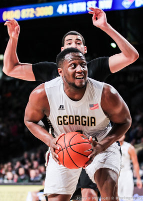 Georgia Tech F Charles Mitchell looks for room under the basket