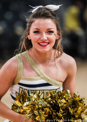 Georgia Tech Cheerleader performs along the sidelines