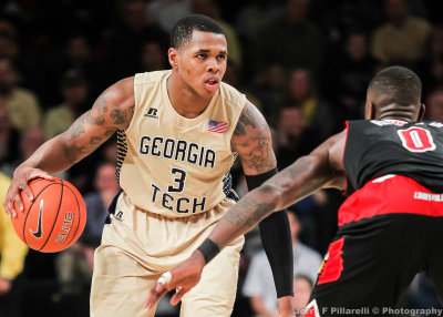 Georgia Tech F Georges-Hunt looks over the Louisville defense