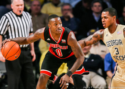 Louisville G Terry Rozier dribbles in front of Georgia Tech F Georges-Hunt