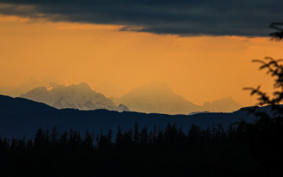 View of the Fairweather Mountain Range on an overcast evening in Glacier Bay National Park