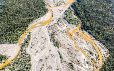 A river with iron deposits runs in Gates of the Arctic National Park