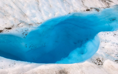 A blue pool on Root Glacier in Wrangell-St Elias National Park