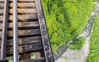 View below as the Alaska Railroad train passes over a trestle bridge
