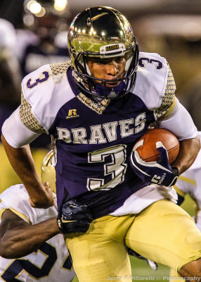 Alcorn St. QB Gibbs fights for yardage against the Georgia Tech defense