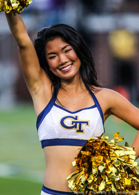 Georgia Tech Dance Team Member cheers for the team 