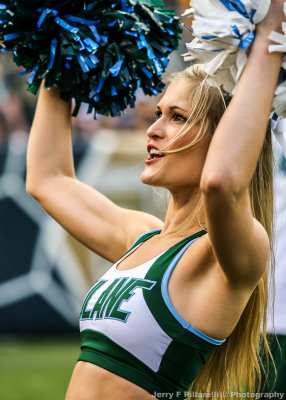 Tulane Dance Team member performs for the Green Wave fans