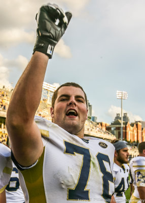 Jackets OL Trey Braun salutes the crowd after the victory over Tulane