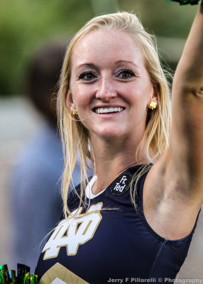 Notre Dame Cheerleader performs on the sidelines