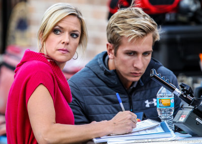 NBC Sports sideline reporter Kathryn Tappen takes notes during a break in the action