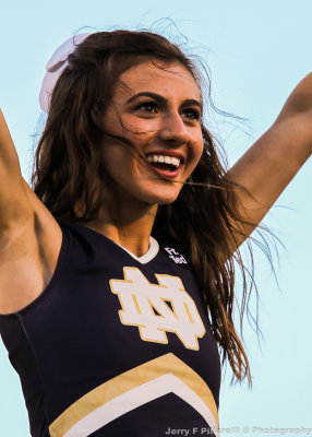 Irish Cheerleader performs for the fans during the game
