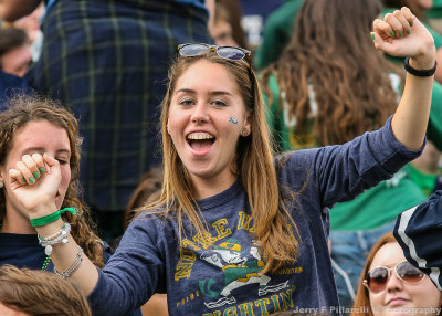 Notre Dame Fan cheers for her team during the game