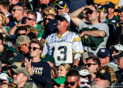 Yellow Jackets Fan is surrounded by Fighting Irish supporters in South Bend 