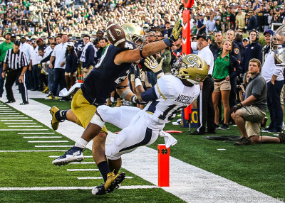 Tech A-Back TaQuon Marshall has a pass into the end zone blocked away by Irish S Nicky Baratti