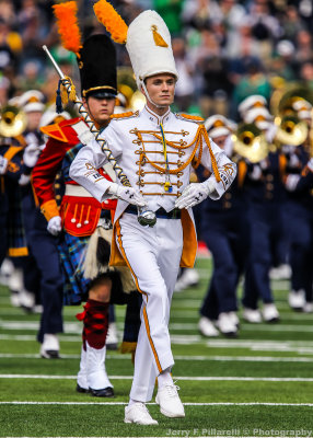 The Head Drum Major leads the Band of the Irish onto the field prior to the game
