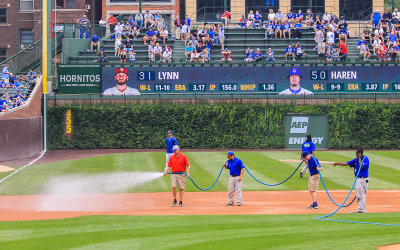 The Wrigley Field grounds crew prepares the field prior to the game