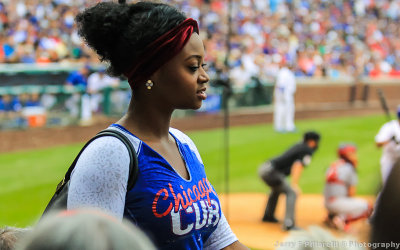 A Chicago Cubs fan strolls by during the game