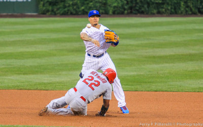 Cubs SS Baez delivers to complete the double play