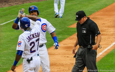 Chicago 2B Castro is welcomed at the plate by OF Austin Jackson after his 2 run homerun