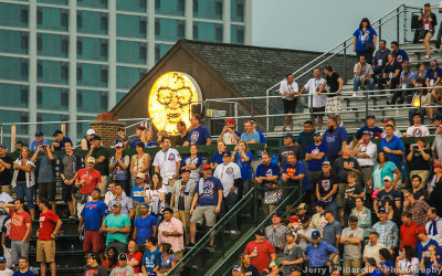 A likeness of Harry Caray shines over the right field Bleacher Bums