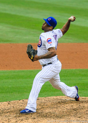 Relief pitcher Pedro Strop delivers a pitch at Wrigley Field