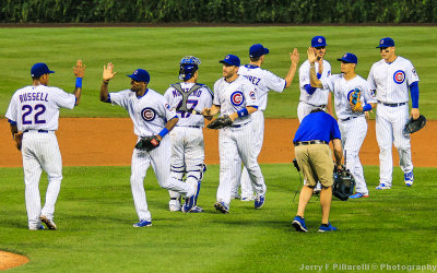 The Cubs celebrate their victory over the Cardinals at Wrigley Field
