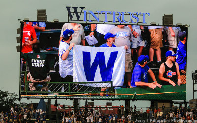 Cubs Fans show the W flag at Wrigley Field