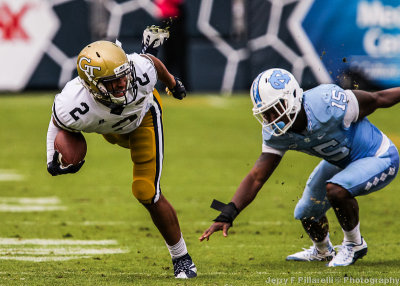 Georgia Tech WR Ricky Jeune gets by North Carolina S Donnie Miles