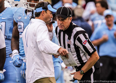 North Carolina Head Coach Larry Fedora has a discussion with an official