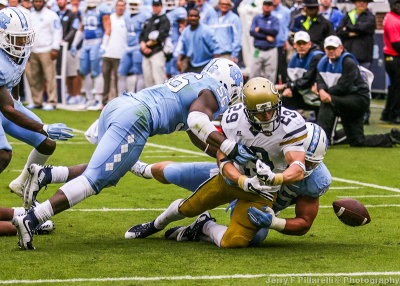 Tech A-Back Austin McClellan fumbles near the goal line