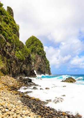 Heavy surf breaks near Pola Island in the National Park of American Samoa