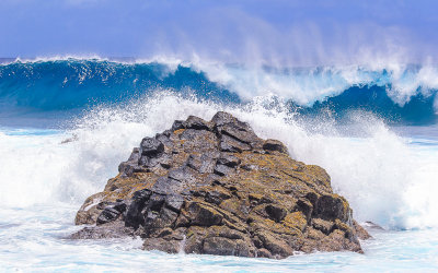 Waves pound the rocks along the Pola Island Trail in the National Park of American Samoa 