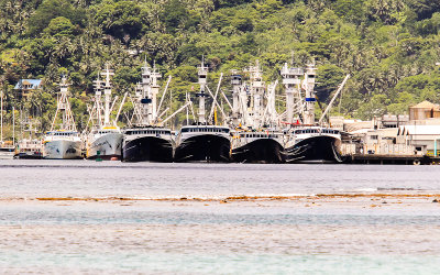 Fishing boats at the dock in the port of Pago Pago in American Samoa