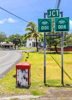 Highway junction 001 and 004 signs in American Samoa